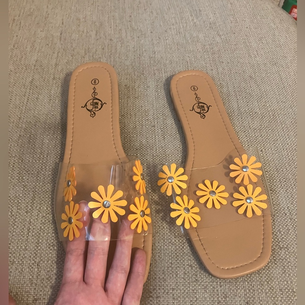 Sole mates sandals with yellow flower design